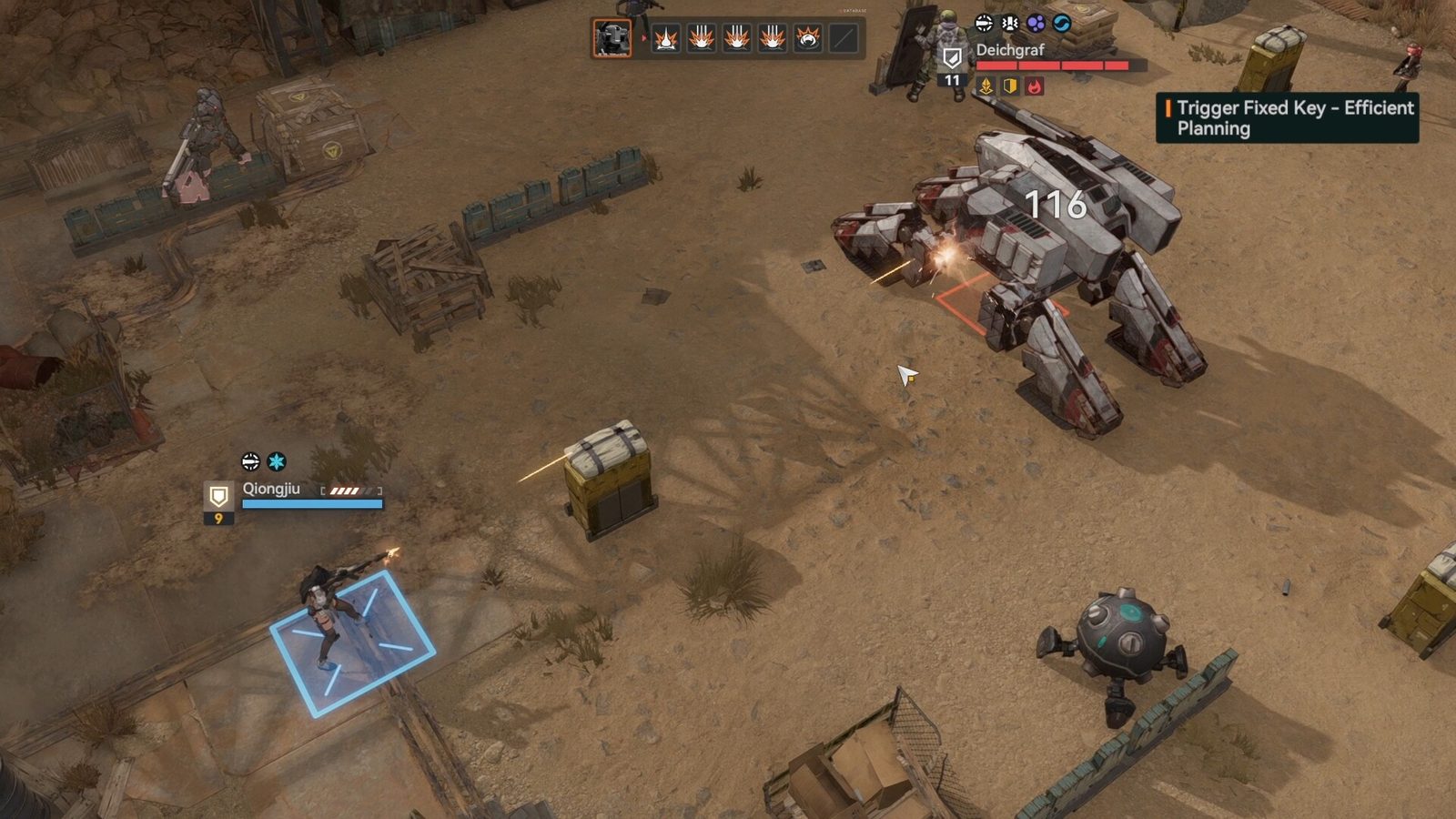 A fight with a large machine on a sandy lot